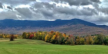 gray clouds over Tomasi Meadow in fall