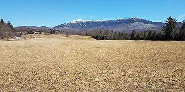 Snow on the mountain over Tomasi Meadow