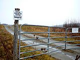 Posted sign at entrance gate to Kikas Valley Farm
