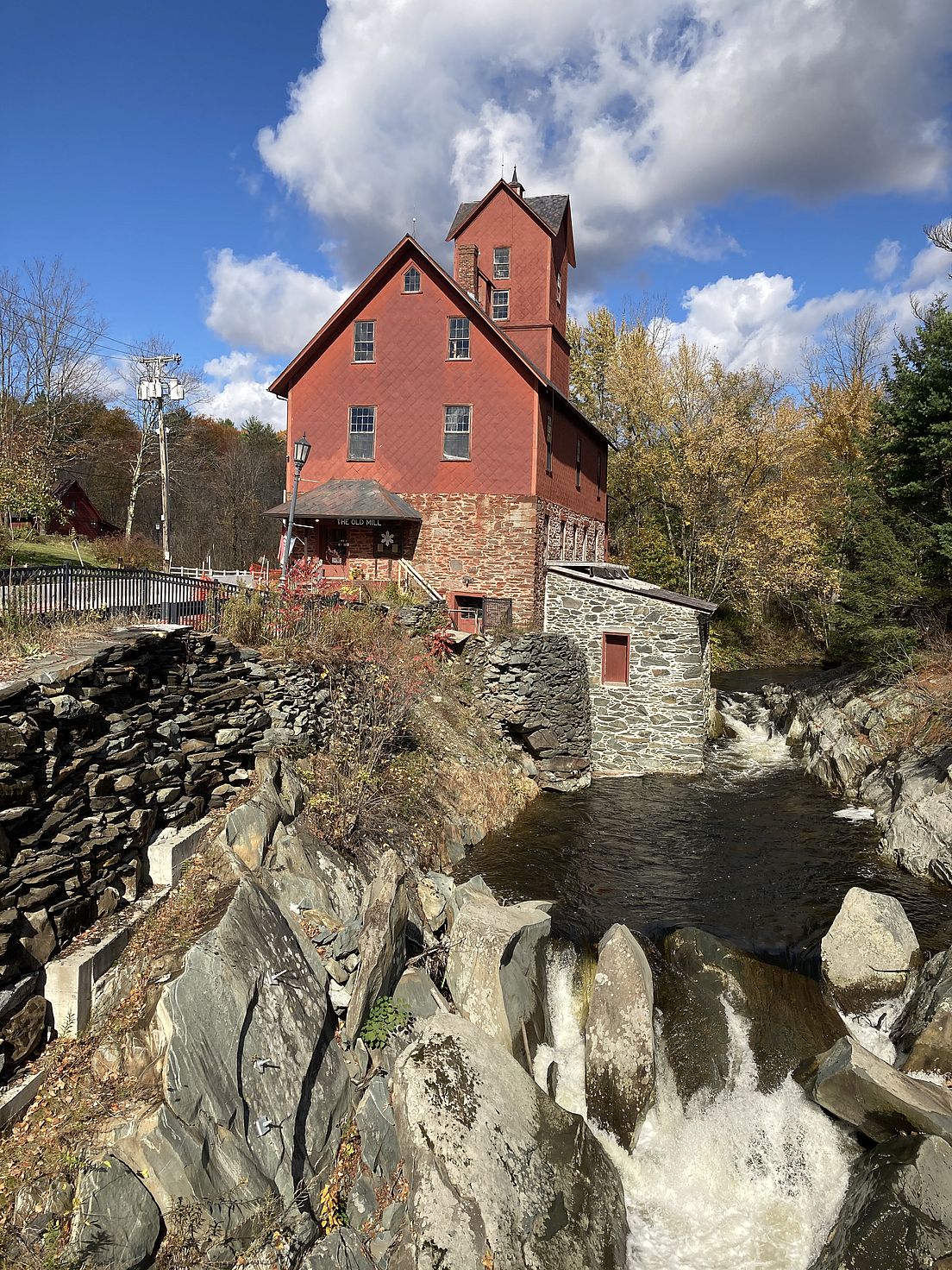 river rushes by the Old Mill in Jericho, VT